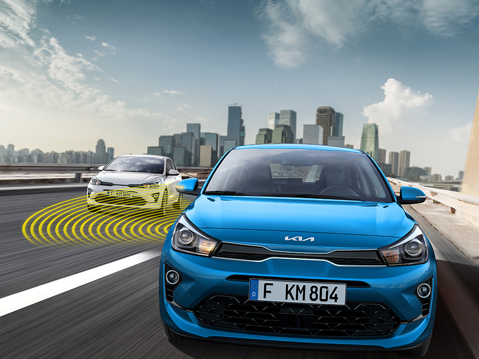 Kia Rio Spurwechselassistent, Infografik, Frontansicht
